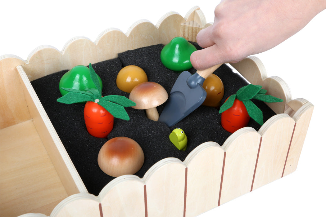 Vegetable garden with play accessories