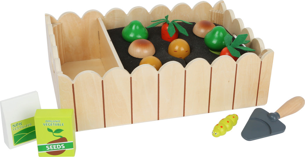 Vegetable garden with play accessories