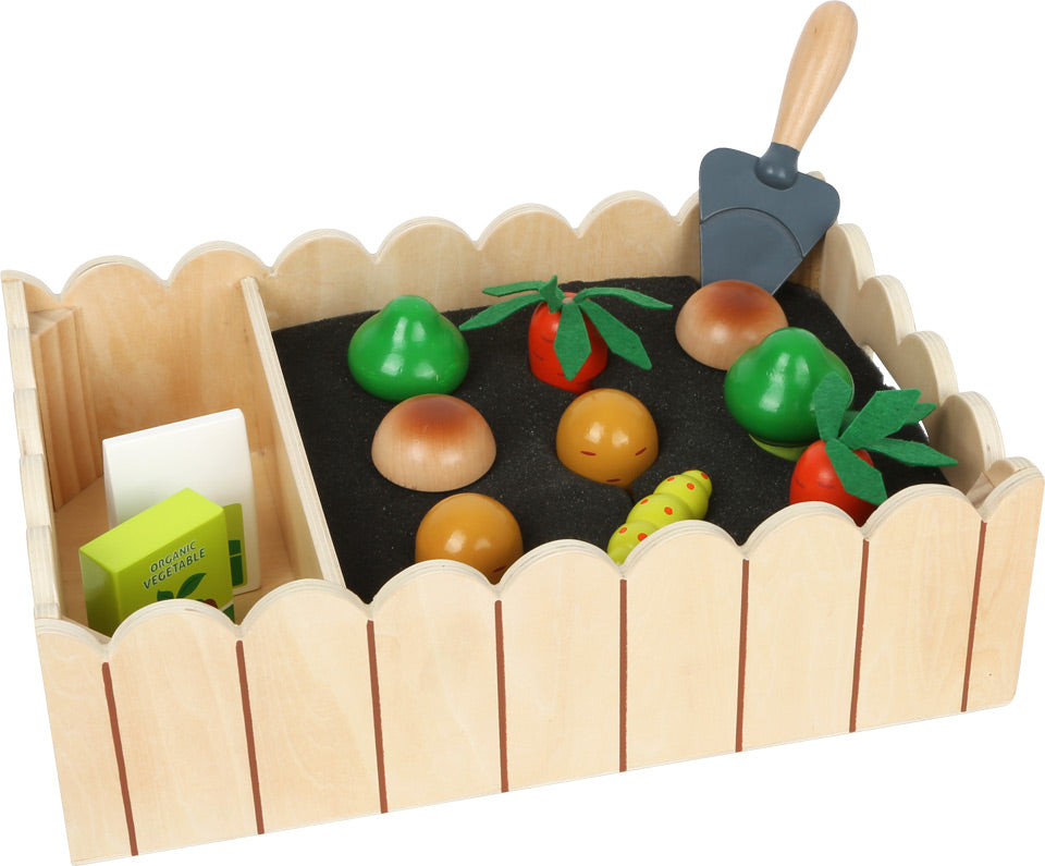 Vegetable garden with play accessories