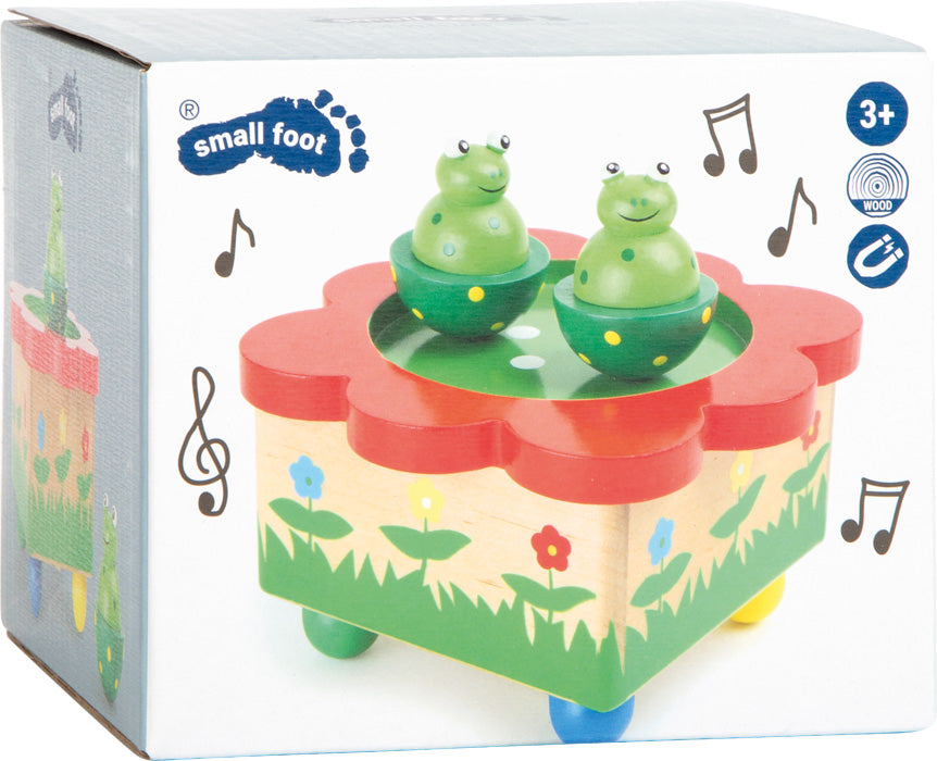 Tin music box with frogs