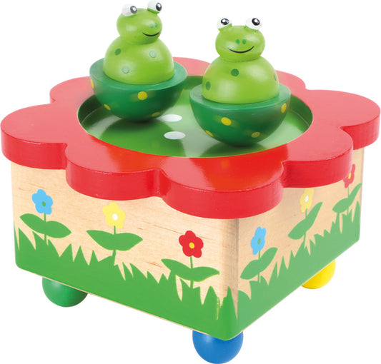 Tin music box with frogs